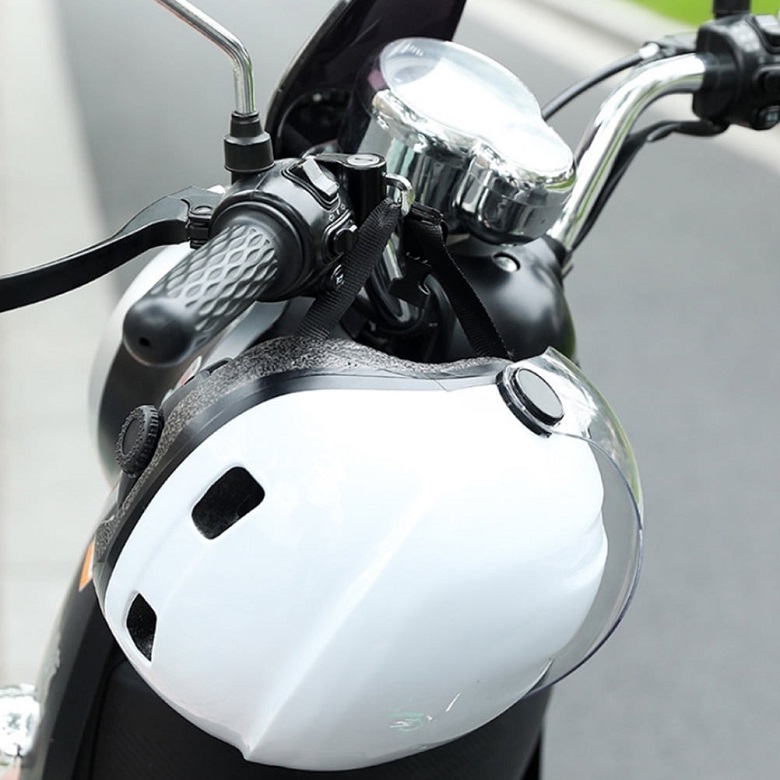 how to use a helmet lock on a motorcycle